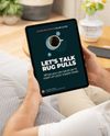 The Let's Talk Rug Pulls guide on a tablet, held in someone's hands